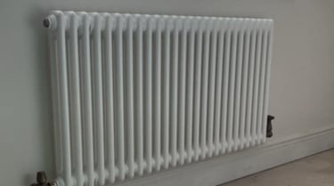 Heated towel rail fitting in Pershore bathroom by PBP Services heating specialists