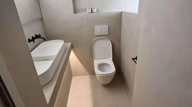 white ceramic toilet with matching sink in contemporary Pershore bathroom