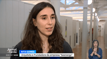 a woman in a black shirt and a microphone