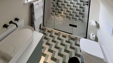Modern walk-in shower installation with tiled walls by PBP Services in Worcestershire