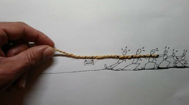 a person holding a string rope with a rope