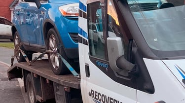 alt="Scrap car being collected from Worcester driveway"