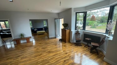 Local Worcester builder reviewing plans with client on-site