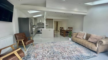 Loft conversion in Malvern featuring Velux windows and neutral interior