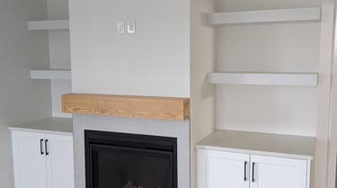 modern fireplace with free floating shelves and storage