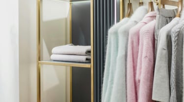 closet organized in a functional organizing method 