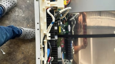 LG heat pump dryer main control board exposed for no power diagnosis – showing wiring harness, relay