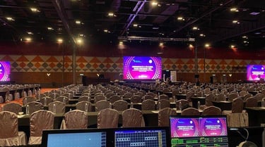 Conference & Corporate Meetings Backdrop setup, AV support, registration counters and signage.