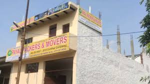 a building with a sign that says Payal packers moversrs movers movers movers