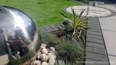 Exotic Modern Dynamic Designer Circle Lawn Tropical Small Garden