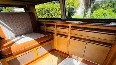Minimalist campervan interior with clever storage solutions