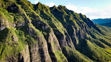 a mountain range with a mountain range in the background