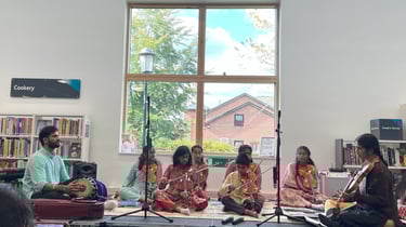 A picture of children performing in library