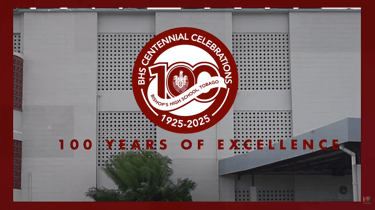 Bishop's High School centennial celebration logo 100 years 1925-2025 signage on building facade.