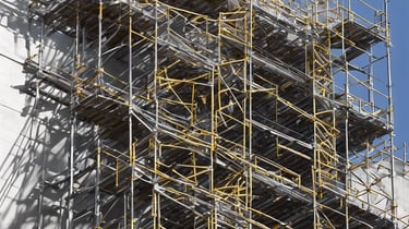 low angle view photography of a gray building