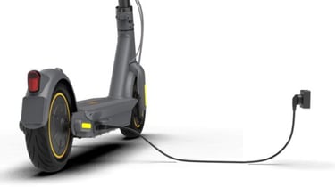 a scooter with a plugged in the middle of it