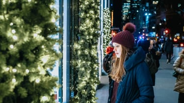 Looking at Shop Windows on Fifth avenue in New York