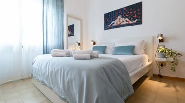 Casa Rava Sul Parco Camera da letto