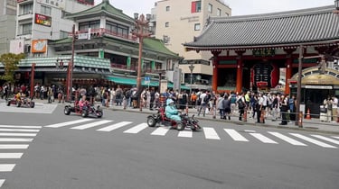 Go-karts passing in front of Kaminarimon Gate in Asakusa, Tokyo