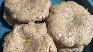 Turkey burger patties (Raw) ready for the grill.