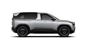 Side view of silver Tata SUV Smart variant with black wheels and a clean, minimal design.