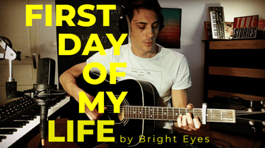 Guitar teacher performing 'First Day Of My Life' by Bright Eyes in home studio