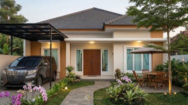 Fasad desain rumah modern kontemporer 1 lantai dengan taman bunga anggrek dan carport mobil Alphard