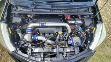 engine bay of supercharged vitz gs