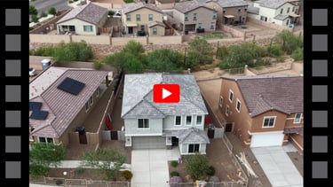 a video game of a house with a video game on the screen