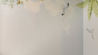 Hand-painted nursery mural sky with seagulls, clouds, and soft morning light — part of an Australian wildlife theme
