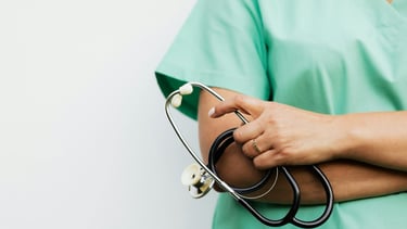 a nurse holding a stethoscope with a stethoscope attached to