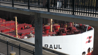 The bow of ship Baie St. Paul underneath the observation platform at Lock 3.
