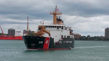 Black and white U.S. Coast Guard cutter approaching the dock in Port Huron.