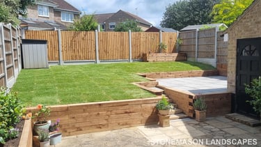 Sleeper Retaining Walls, Planters & Steps With Grey Sandstone Patio & Lawn