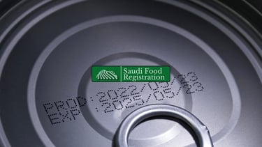 Saudi Food Registration Logo Overylay with production and expiry dates on bottle behind
