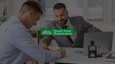 Consultant providing government liaison services for SFDA approvals in Saudi Arabia during an office meeting.