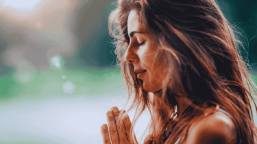 a woman in focused on deep meditation