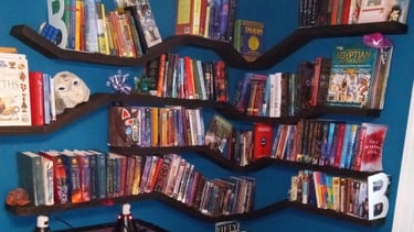 Floating shelves unit with multiple angles, filled with books