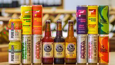 row of thc beverages in bottles and cans