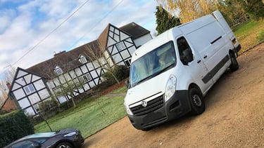 mr van business van parked outside a house