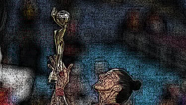 a woman holding a trophy in front of a wall