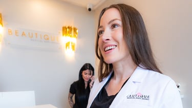 A woman in a lab coat at Beauty Spa Rbcontent Productions
