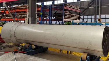 PMI Piping large welded pipes in workshop