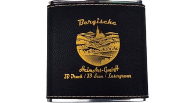 a flask flask with a black leather flasket