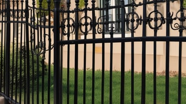 A skilled worker welding metal pieces in a workshop.