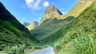 a road with a mountain view of a road
