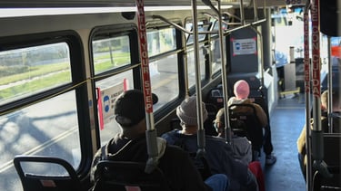 Photo taken from the back of a public bus