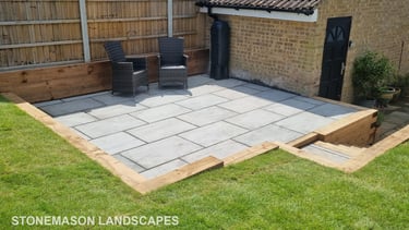 Sleeper Retaining Walls, Planters & Steps With Grey Sandstone Patio & Lawn