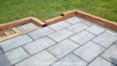 Sleeper Retaining Walls, Planters & Steps With Grey Sandstone Patio & Lawn