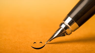a pen with a smiley face drawn on it